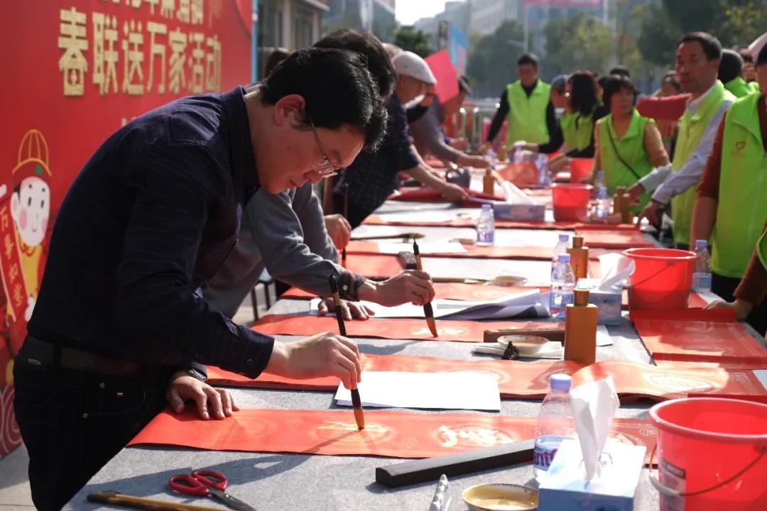 新时代文明实践 | 麻涌举行2022年“墨香四溢迎虎年”春联送万家活动